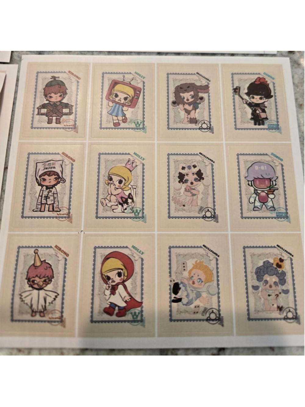 6 sticker sheets that are size 5 in by 5 in - pop mart characters